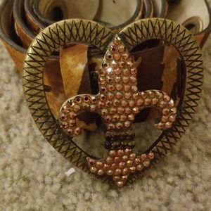 Bridget Schuster cow hide belt with fleur de lis